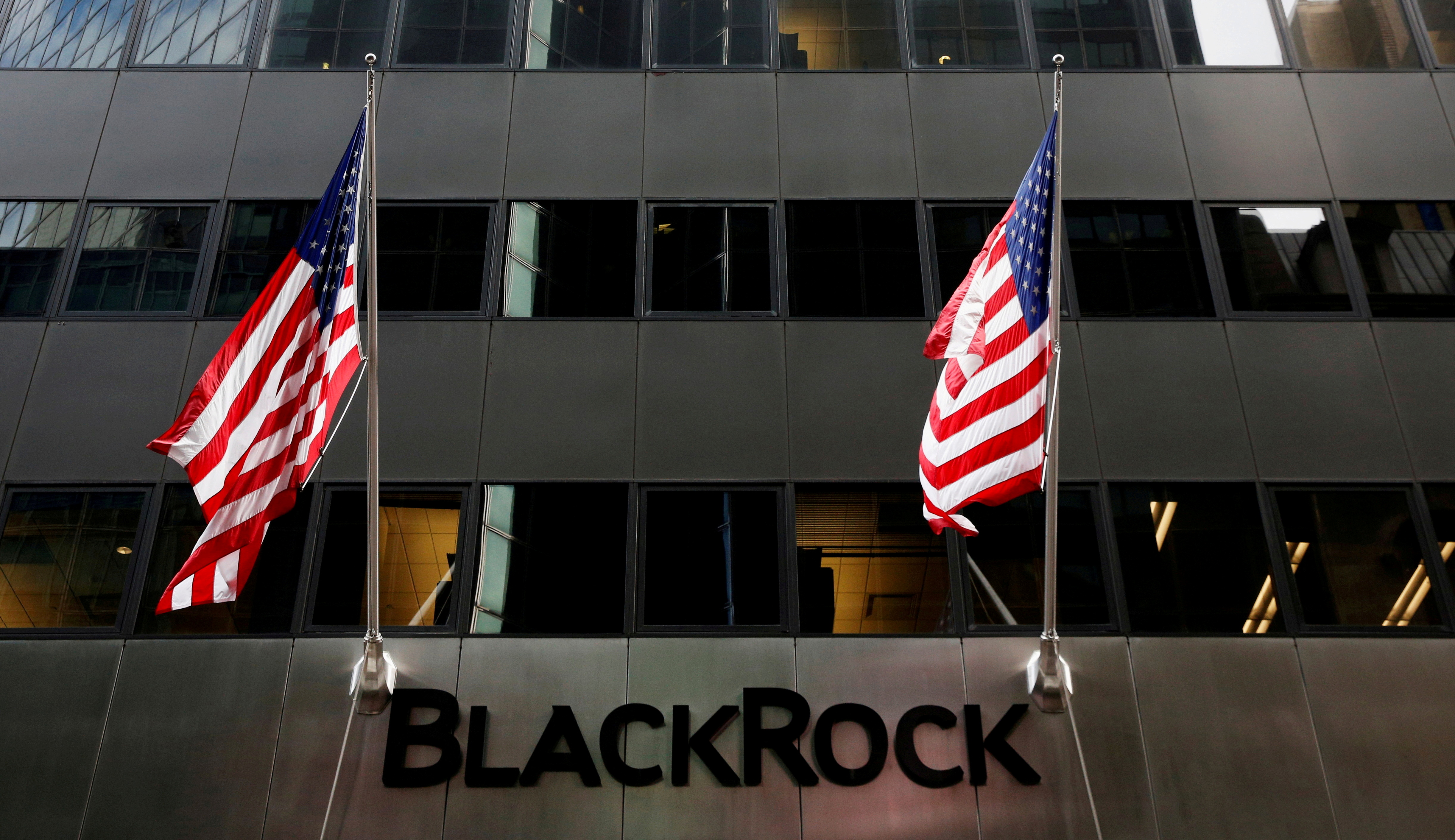 The BlackRock logo is seen outside of its offices in New York